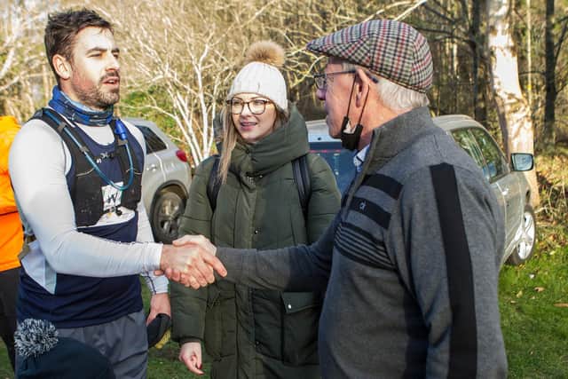 A handshake for Chris at the finish from proud dad and former Scottish international, Roy Laidlaw (picture by Bill McBurnie)