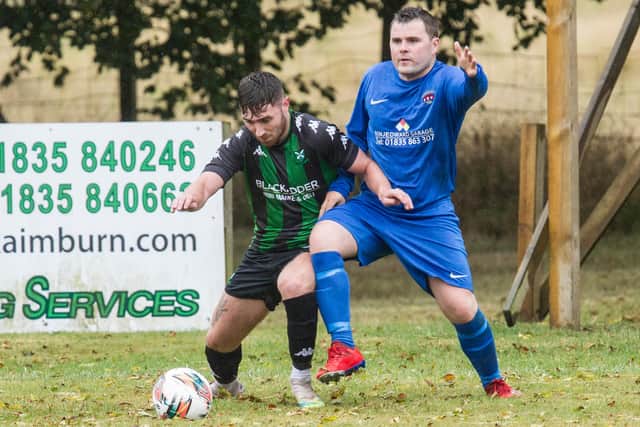 Stuart Spence for Ancrum coming up against Jason McIntosh for Greenlaw (Photo: Bill McBurnie)