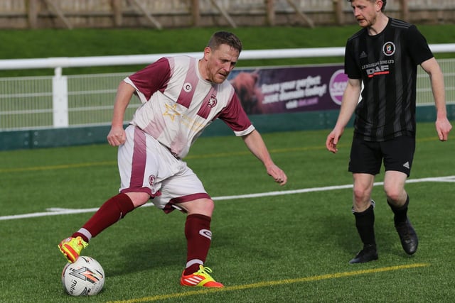 Goal-scorer Des Sutherland on the ball during Langlee Amateurs' 4-1 victory at home to Duns Amateurs at Netherdale on Saturday to go back to the top of the Border Amateur Football Association's A division (Photo: Brian Sutherland)