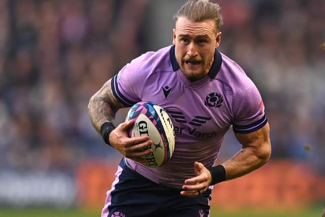 Stuart Hogg on the ball for Scotland during their 31-23 loss to New Zealand at Edinburgh's Murrayfield Stadium in November in front of a crowd including former Scottish international Doddie Weir (Photo by Stu Forster/Getty Images)