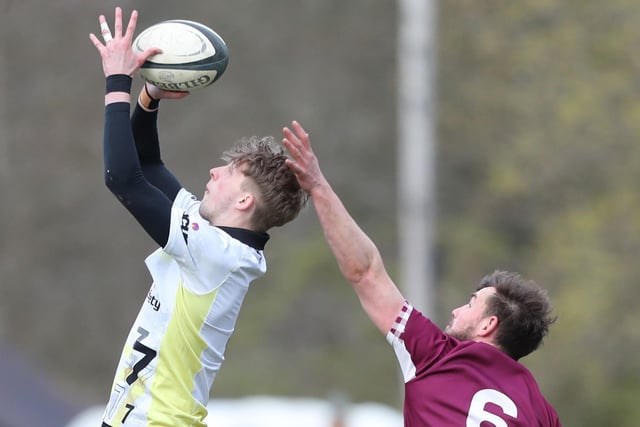 Melrose's Hamish Weir beating Gala's Angus Dun to a high ball in the final at 2024's Langholm Sevens on Saturday (Photo: Brian Sutherland)
