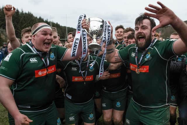 Hawick players celebrating winning rugby's Scottish Premiership trophy against Currie Chieftains at home at Mansfield Park in March (Photo by Mark Scates/SNS Group/SRU)