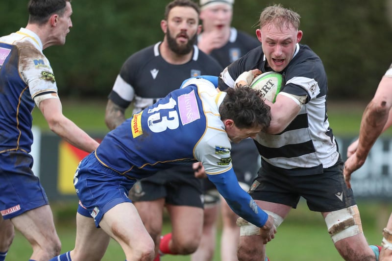 Cammy Brown being tackled by Gregor Young during Kelso's 48-12 win at Jed-Forest's Riverside Park on Saturday in rugby's Scottish Premiership (Photo: Brian Sutherland)