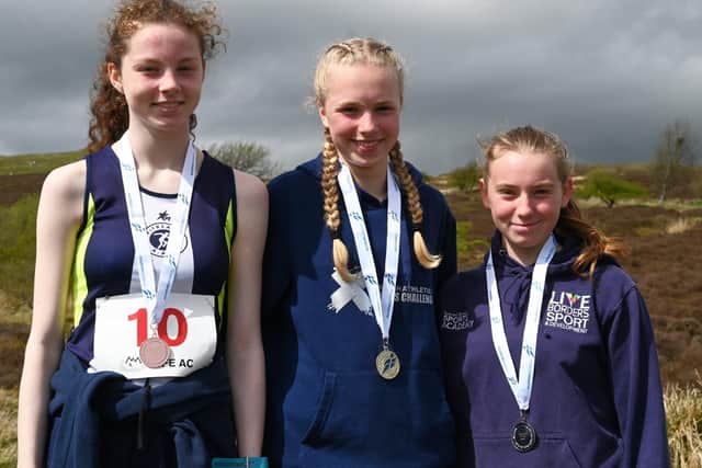 From right, Gala Harrier Isla Paterson, Highland's Katie Meek and Pitreavie's Ariane Baillie at the latest junior Scottish hill-running championships at East Lomond in Fife (Photo: Neil Renton)