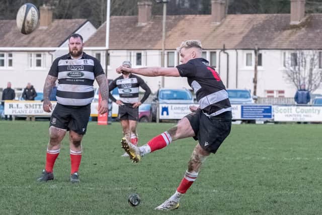 Dwain Patterson kicking the penalty that secured Kelso an 18-15 derby victory against Melrose on Saturday (Pic: Charles Brooker)
