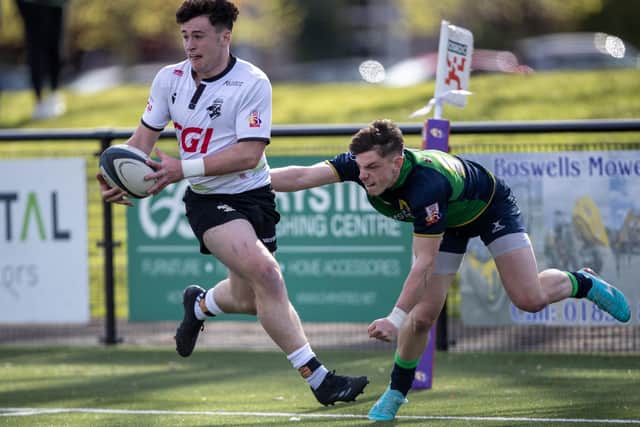 Southern Knights' Nairn Moncrieff going up against ex-Gala team-mate Matt Reid during their 34-17 Fosroc Super Series Sprint win at home to Boroughmuir Bears at Melrose's Greenyards on Saturday (Photo: Craig Murray)