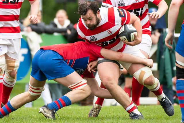 Hawick's Shawn Muir being tackled during Sunday's inter-district championship final between South of Scotland and Caledonia Reds at Braidholm in Glasgow (Photo by Euan Cherry/SNS Group/SRU)