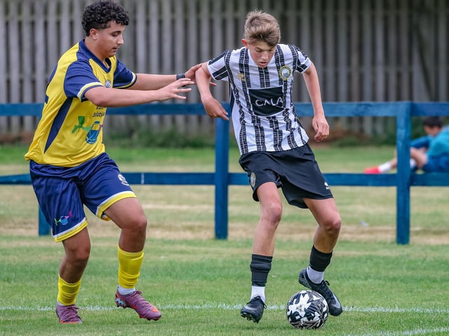 Nazir Sayed making a challenge for Vale of Leithen under-20s during their first game ever, a 6-1 friendly defeat at home to Dunbar United under-20s last Friday at Victoria Park in Innerleithen (Photo: Hilary Isaac)
