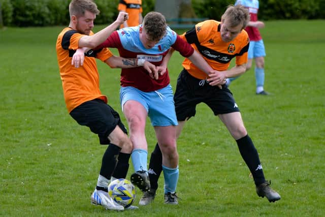 Hawick United on the defensive during their 2-1 home loss to St Boswells on Saturday (Pic: Alwyn Johnston)