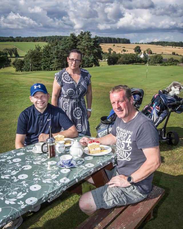 Naomi Fouracres, caterer at Jedburgh Golf Club, attending to golfers David Whitecross and Graeme Renwick at the 19th hole. (Photo: BILL McBURNIE)
