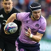 Darcy Graham on the ball for Scotland versus New Zealand at Edinburgh's Murrayfield Stadium in November (Photo by David Rogers/Getty Images)