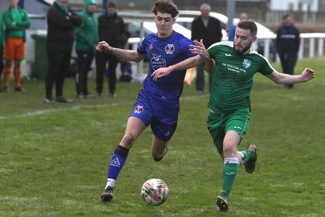 Hawick Royal Albert's Harry Fowler and Thornton Hibs' Matthew Robertson vying for the ball at Albert Park on Saturday (Pic: Steve Cox)