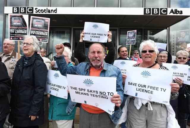 Older people protest against the licence fee changes for over-75s at the BBC Scotland HQ in Glasgow's Pacific Quay.