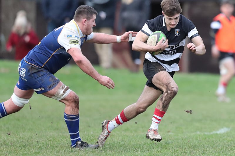 Archie Barbour getting away from Clark Skeldon during Kelso's 48-12 win at Jed-Forest's Riverside Park on Saturday in rugby's Scottish Premiership (Photo: Brian Sutherland)