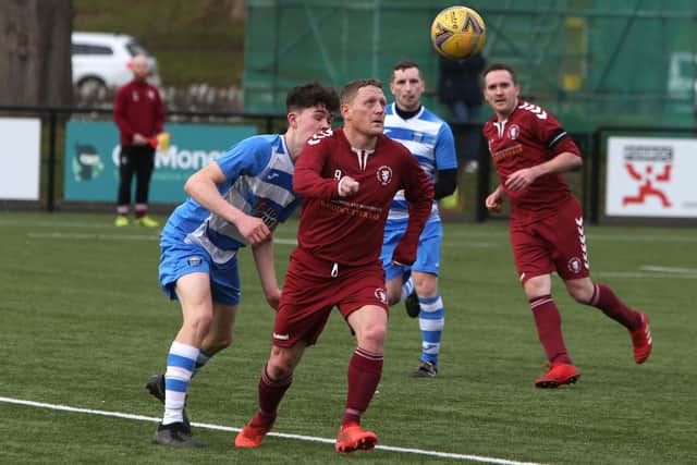 Langlee Amateurs and Tweedmouth Amateurs vying for possession during the former's 5-1 Waddell Cup second-round win in Melrose on Saturday (Photo: Steve Cox)
