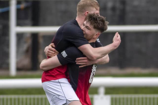 Gala Fairydean Rovers midfielder Ciaren Chalmers, right, being congratulated on scoring one of his two goals against open Goal Broomhill on Saturday (Pic: Thomas Brown)