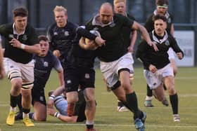Hat-trick hero Gary Lowrie on the attack during Hawick Force's 50-29 Border junior league cup final victory over Selkirk A at Hawick's Volunteer Park on Friday (Pic: Malcolm Grant)