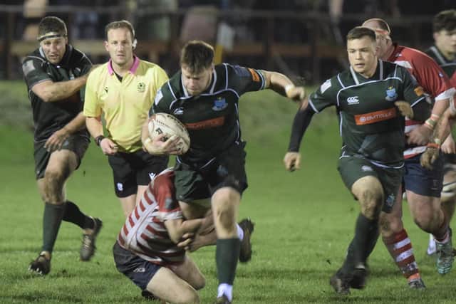 Andrew Mitchell in possession, supported by Calum Renwick and Russell Anderson, during Hawick's 38-7 Border League win away to Peebles at the Gytes on Friday (Photo: Malcolm Grant)