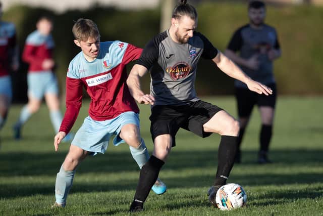 Jordan Gracie on the ball for Selkirk Victoria during their 12-1 loss at St Boswells on Saturday in the Border Amateur Football Association's B division (Photo: Brian Sutherland)