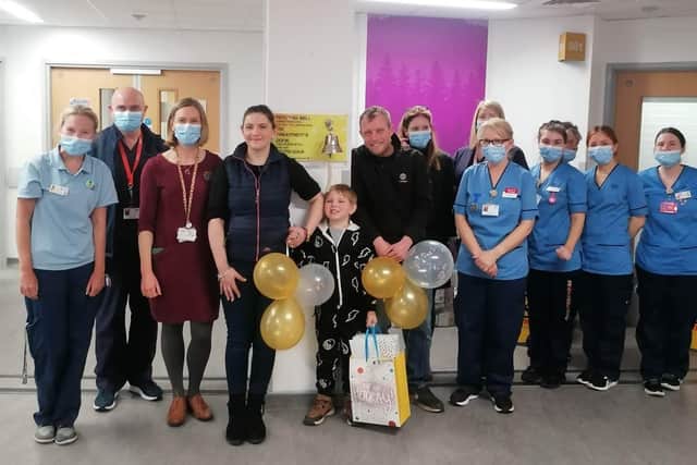 The sweet sound of victory. Oscar marks the end of his treatment with staff at Edinburgh Royal Infirmary.
