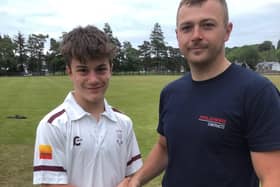 Gregor Borthwick being congratulated on making his senior debut for Selkirk at the age of 13 versus Kelso last night by skipper Greg Fenton (Photo: John Smail)