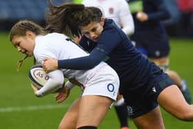 Get a grip ... Lisa Thomson, right, tackles England's Jess Breach in a Six Nations match last year (photo by Paul Devlin / SNS Group / SRU).
