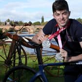 Fin Graham with the two silver medals he won at 2021's Tokyo Paralympics (Pic: George Carrick)