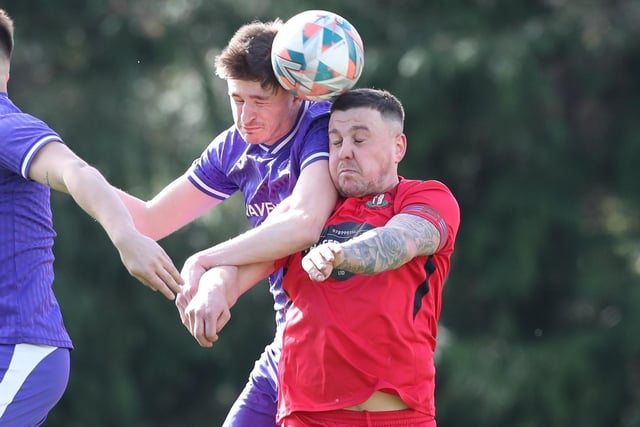 Daniel Simpson, right, making an aerial challenge during Earlston Rhymers' 3-0 win at home to Hawick Waverley on Saturday in the Border Amateur Football Association's A division (Photo: Brian Sutherland)