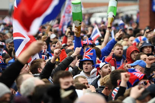 Rangers fans gather at Glasgow's Ibrox Stadium to celebrate the club winning the Scottish Premiership for the first time in 10 years on March 7 (Photo by Jeff J Mitchell/Getty Images)