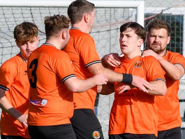 Hawick United players celebrating scoring during their 9-1 loss away to Duns Amateurs in round one of this football season’s Waddell Cup on Saturday (Photo: Alan Raeburn)