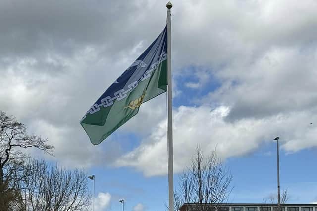 Flying the new county flag.