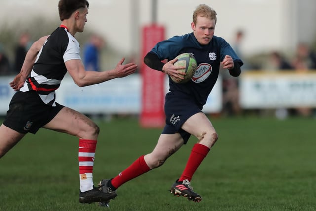 Andrew Davidson on the ball for Selkirk A during their 26-0 round-one defeat by Kelso Sharks at this year's John Laing Sevens atPoynder Park (Photo: Brian Sutherland)
