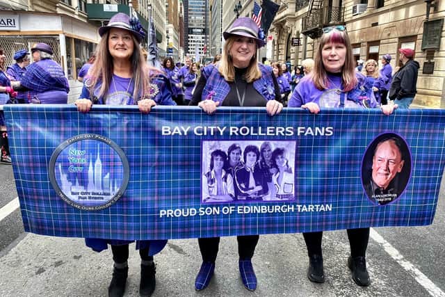 Eileen Longmuir (centre), wife of the late Alan Longmuir, founder of the Bay City Rollers, with Sheila Beehler Nitz (left) and  Kathy 'Kat' Connor (right) prepare to lead fans ahead of New York's Tartan Day Parade
