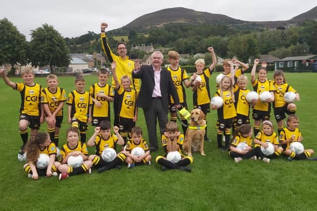 Leaderdale and Melrose councillor David Parker with players for the launch of the town youth team's new kit