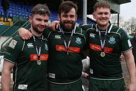Shawn Muir, centre, with, left, Stuart Graham and Shaun Fairbairn after 2023's Scottish Premiership play-off final win (Pic: Steve Cox)