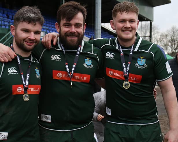 Shawn Muir, centre, with, left, Stuart Graham and Shaun Fairbairn after 2023's Scottish Premiership play-off final win (Pic: Steve Cox)