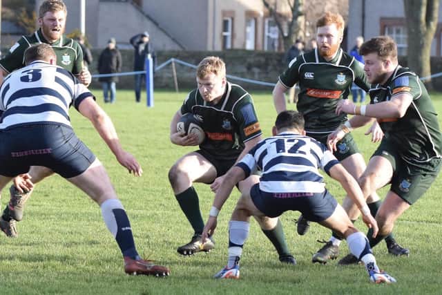 Fraser Renwick in possession during Hawick's 19-17 win away to Heriot's Blues on Saturday (Photo: Malcolm Grant)