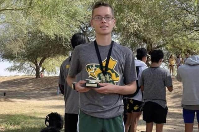 Thomas MacAskill with the prize he won for finishing tenth in the George Young invitational 8,000m race in Coolidge in Arizona this month