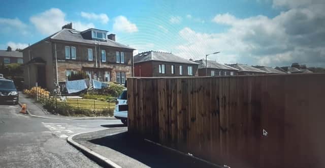 Council planners say the Ettrick Terrace fence is too high.