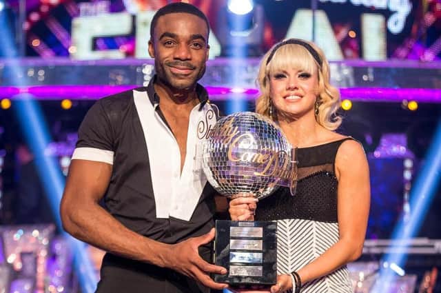 Joanne Clifton and Ore Oduba with the glitter-ball trophy after they won the final of Strictly Come Dancing in 2016