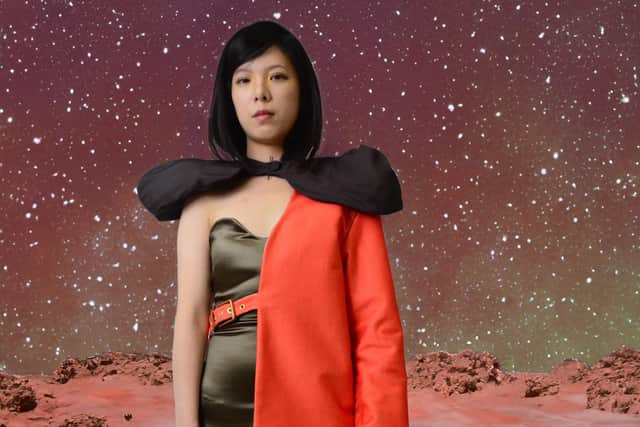 Model Yiqi Wang wears a Mars-inspired fashion design.