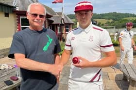Former Selkirk player George Thomson, sponsor of the match-ball for Sunday’s 165-run loss at home to Clackmannan County, with home skipper Greg Fenton (Pic: John Smail)