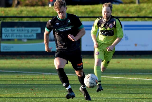 Greenlaw on the ball during their 2-1 loss to Langlee Amateurs at Melrose on Saturday (Photo: Alwyn Johnston)