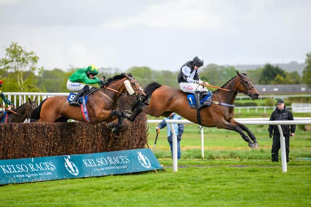 Conor O'Farrell on trainer Iain Jardine's Exit to Where, left, and Danny McMenamin on Paul Robson's Just Don't Know in the 1.40pm Racing TV Handicap Chase at Kelso on Wednesday (Pic: Alan Raeburn)