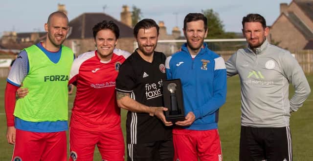 Zander Murray (left) and Martin Scott (right), pictured with Coldstream midfielder Ross Aitchison (Pic by Thomas Brown)