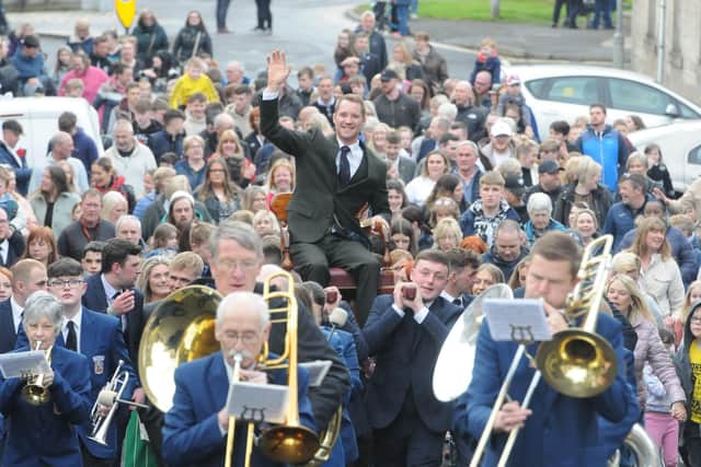 Selkirk Royal Burgh Standard Bearer Thomas Bell is chaired around the town. Photo: Grant Kinghorn.