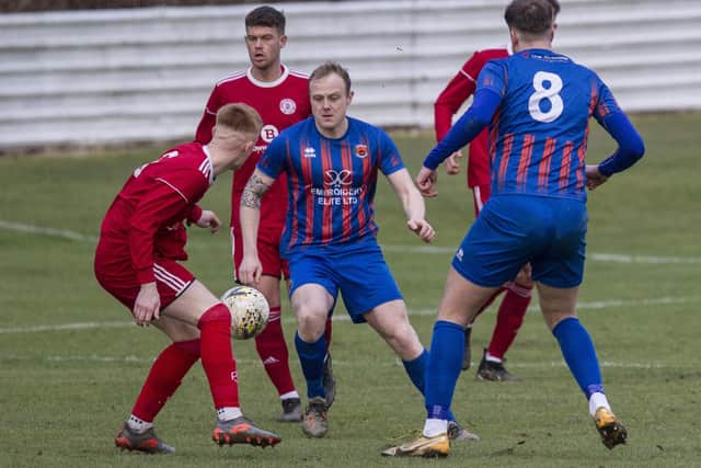 John Shankie challenging for possession for Hawick Royal Albert during their 3-0 victory over Peebles Rovers in January (Photo: Bill McBurnie)