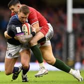 Hawick's Stuart Hogg being tackled by Wales centre Owen Watkin during Scotland's Six Nations match in Cardiff on Saturday (Photo by Clive Mason/Getty Images)