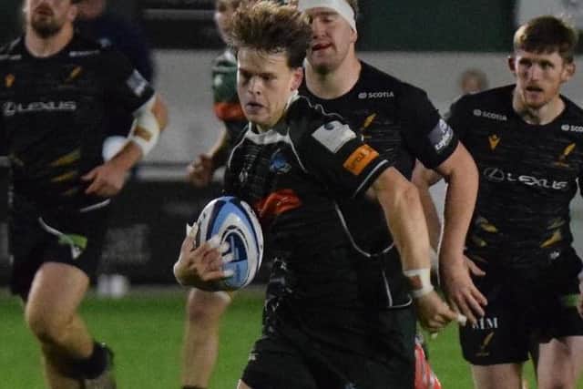 Hector Patterson en route to scoring a try for Hawick as they beat Currie Chieftains 38-26 at home at Mansfield Park on Friday (Photo: Malcolm Grant)