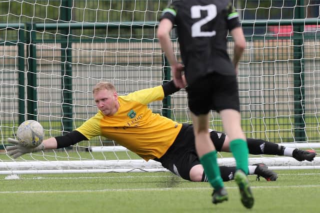 Biggar United having a shot stopped during their 4-0 Walls Cup final win against Hawick Legion on Saturday (Pic: Brian Sutherland)
